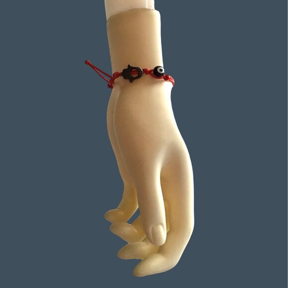 RED ADJUSTABLE BRACELET WITH EVIL EYE AND HAND CHARM - Picture 2 of 3